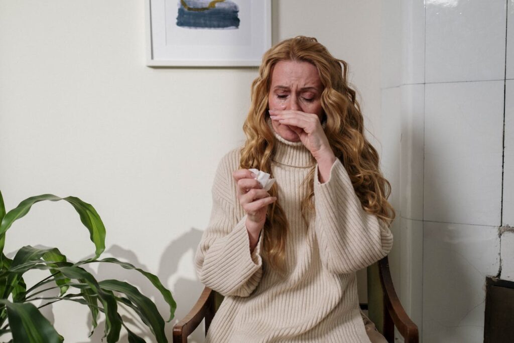 A woman catches a common cold due to a vitamin deficiency.