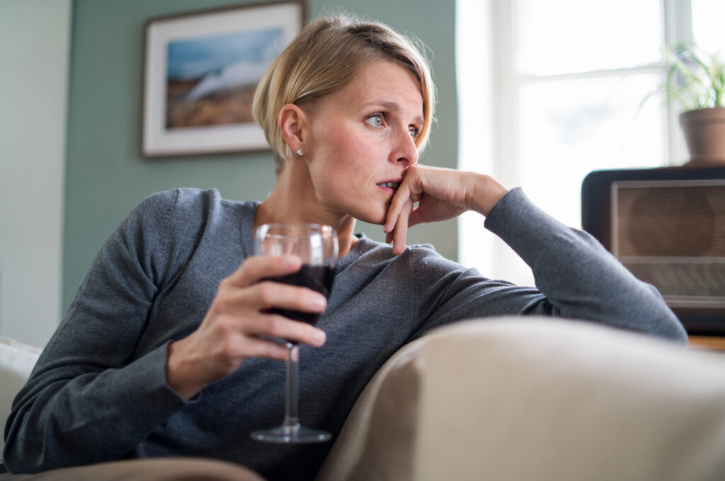 woman drinking alcohol before bed