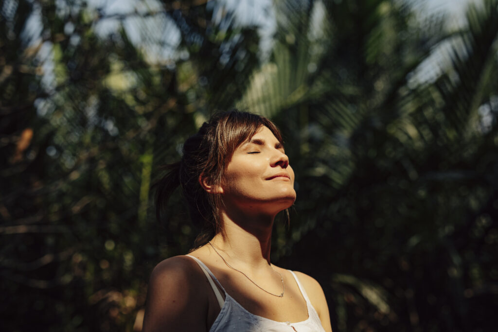 woman maximizing natural light exposure